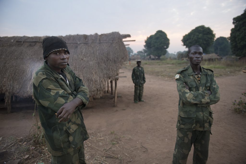 Congolese soldiers on duty in Duru village in northern DRC close to the border with South Sudan, beside a road used by South Sudanese refugees fleeing fighting in Yambio Western Equatoria.