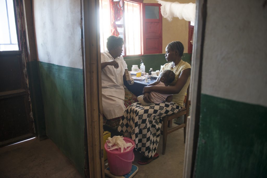 Saint Daniel Comboni pediatric Clinic in Dungu. Justine Underete, 22, with her sick daughter Fozia, 15 months. She fled from South Soudan with her two daughters. 'The fighting broke out at night when my husband had travelled, there were gunshots very close, they even burnt the neighbour’s house, they were shooting at random everywhere'.