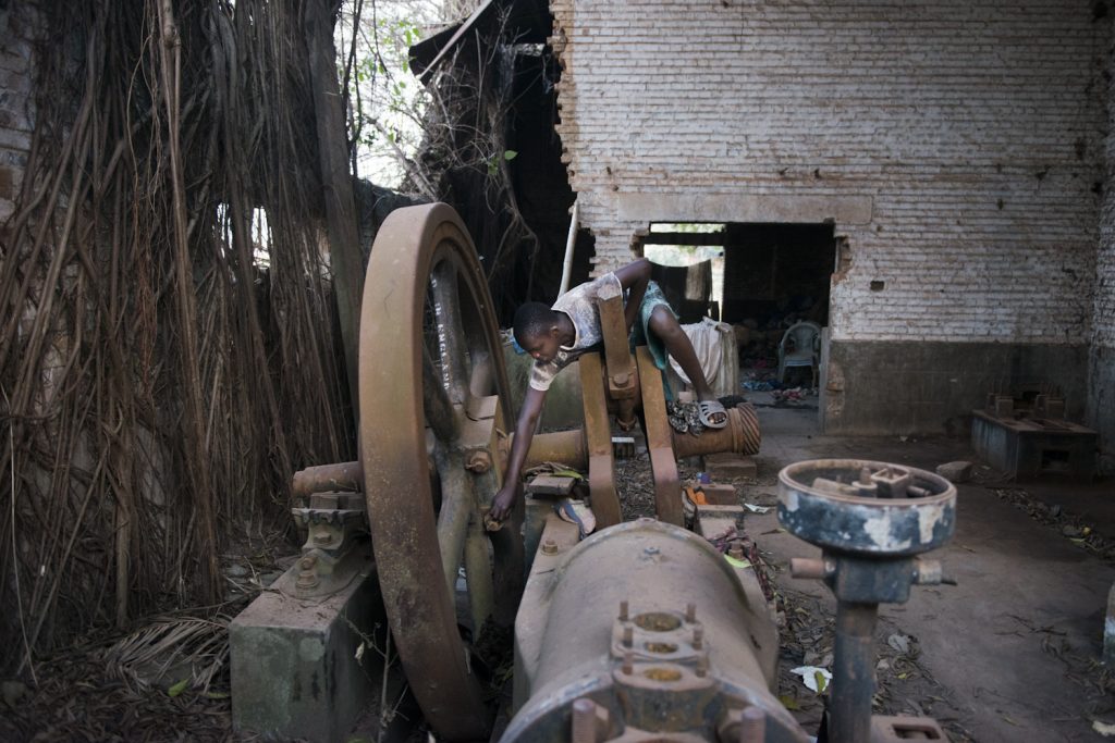 A kid playing in a former cotton industrial plant in Dungu.Haut Uele province, Nothern DRC.